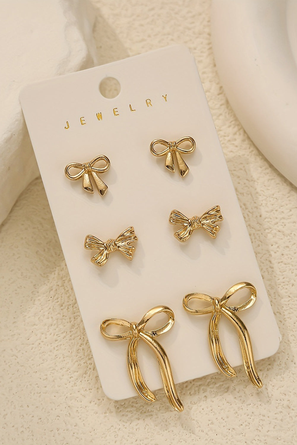 Golden Bow Trio Stud Set